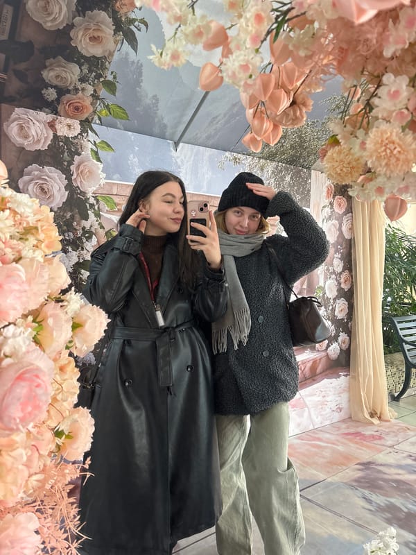 Women take selfies in decorated indoor space in Perm