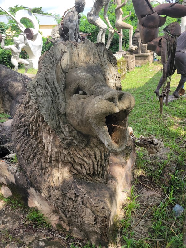 Touring an outdoor sculpture garden at a Nigerian fine arts department