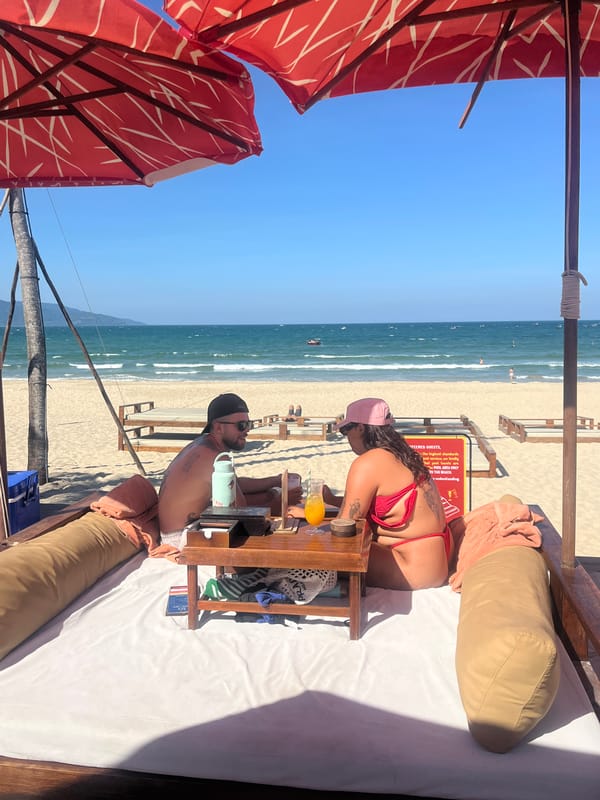 Beach resort guests enjoy pizza and drinks in sunny Đà Nẵng
