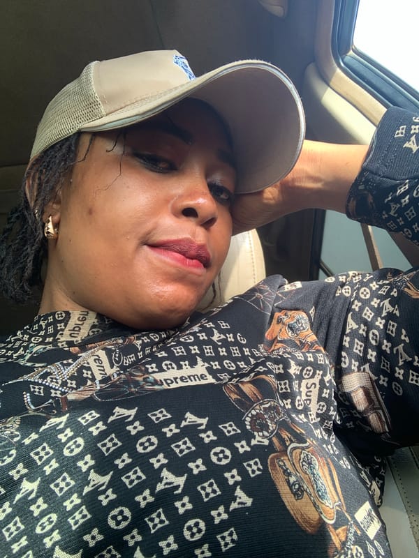Woman photographed in car during morning in Sabon Tasha Nigeria