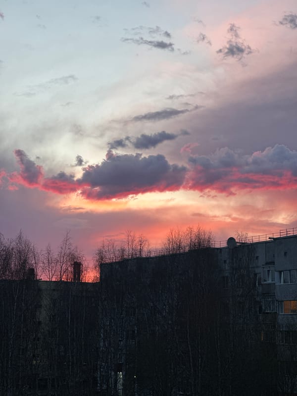 Dramatic sunset colors illuminate Surgut, Russia skyline