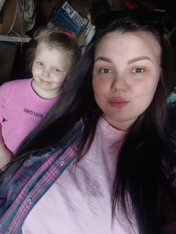 Woman and child observed together in indoor setting
