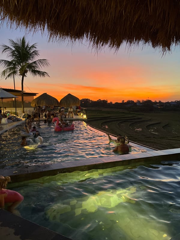 Sunset pool gathering captured in North Kuta, Indonesia