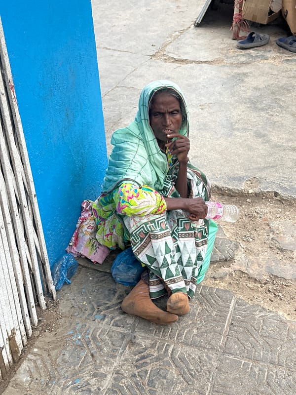 Street life along a busy Karachi urban corridor