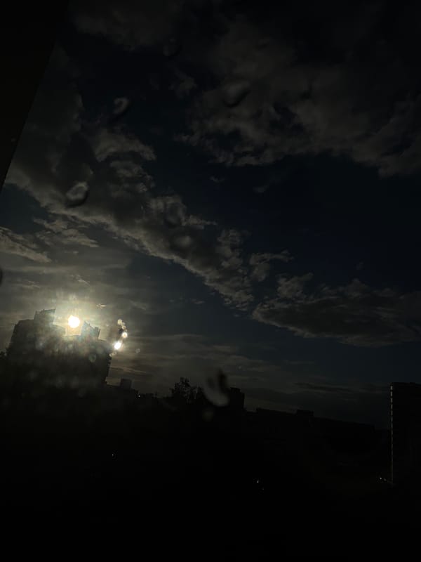 Dramatic sky transition from storm clouds to sunshine over Minsk