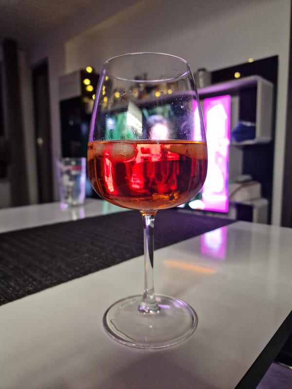 Evening dining captured in Sofia with wine and tomatoes