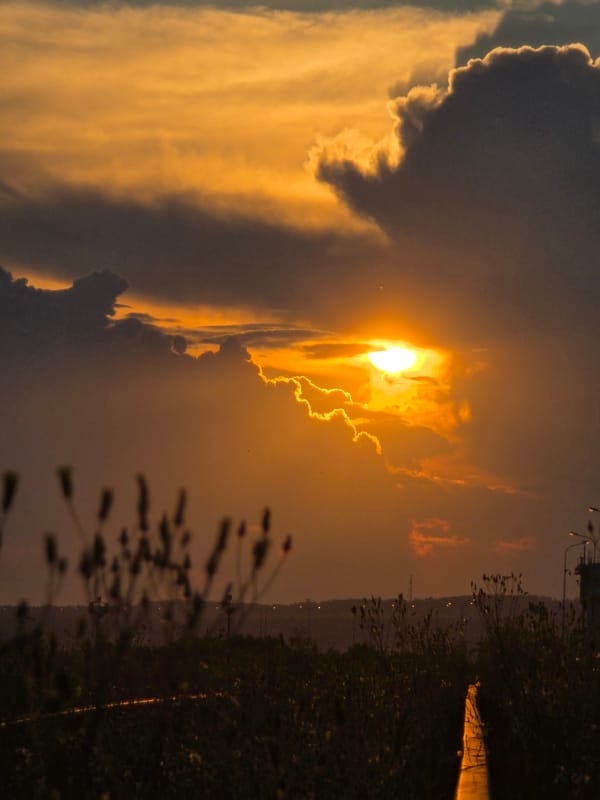 Golden hour exploration of abandoned railway and riverside in Chaikovsky