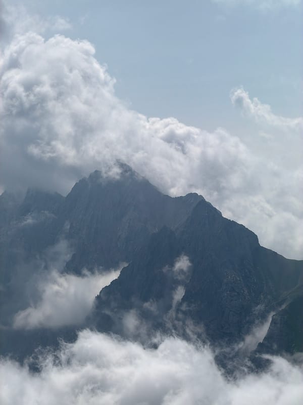 Zugspitze summit and chapel on a misty morning