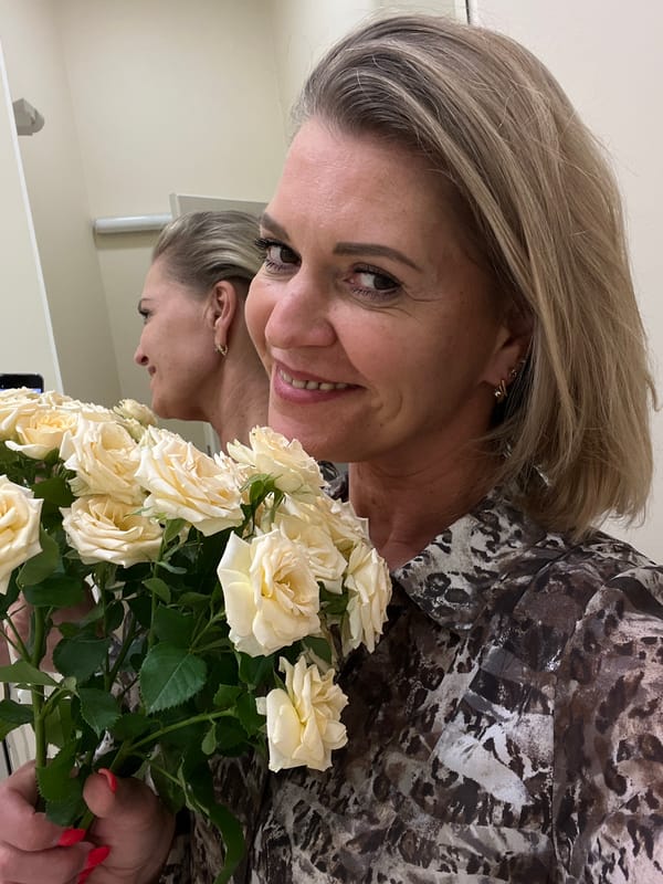 Woman receives flowers, gifts in Kaliningrad celebration moment