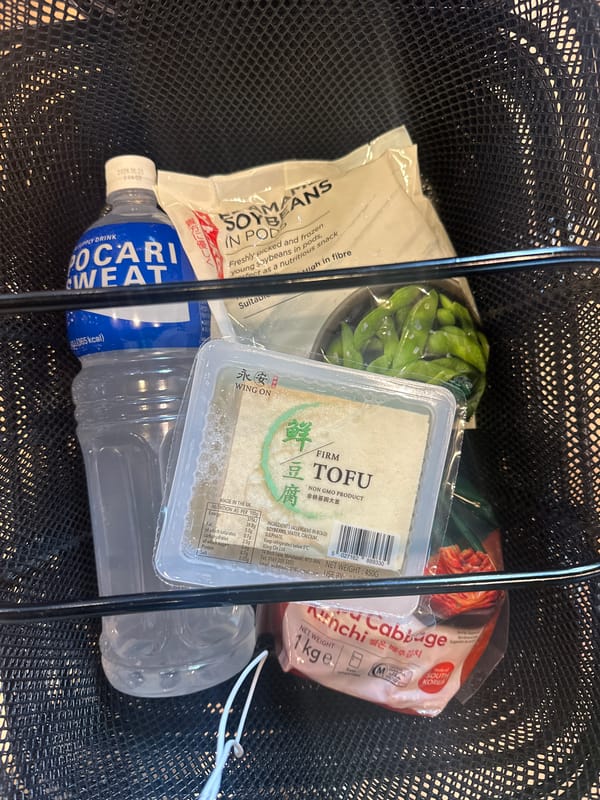 Shopper browses Asian snacks at London supermarket Sunday afternoon