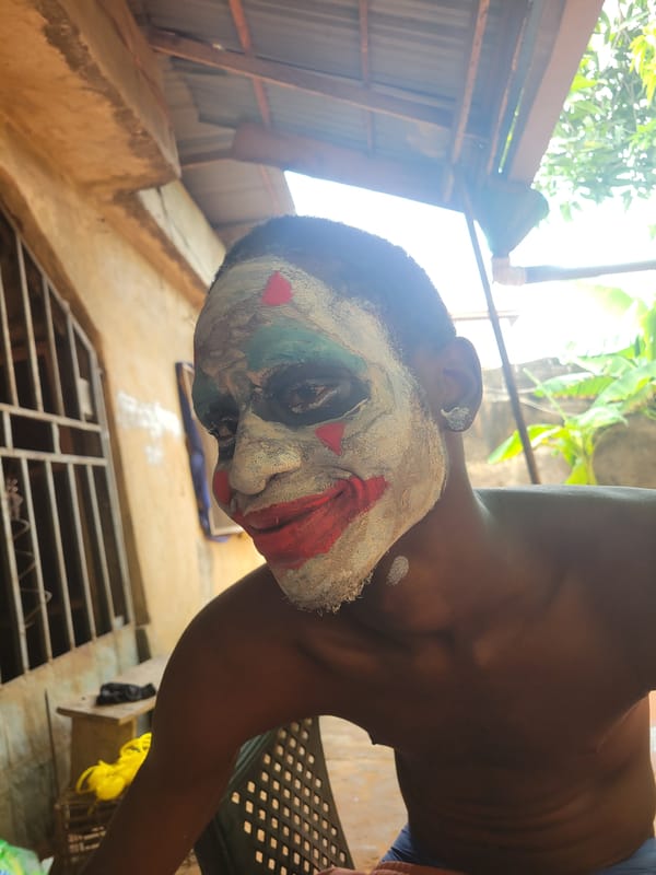 Person in colorful face paint and costume captured