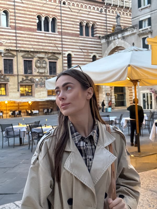 Tourist visits Verona landmarks during evening hours