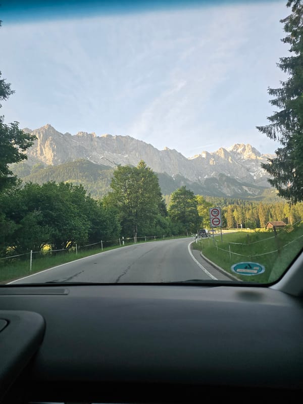 Morning drive through Grainau's mountain roads captured on dashboard