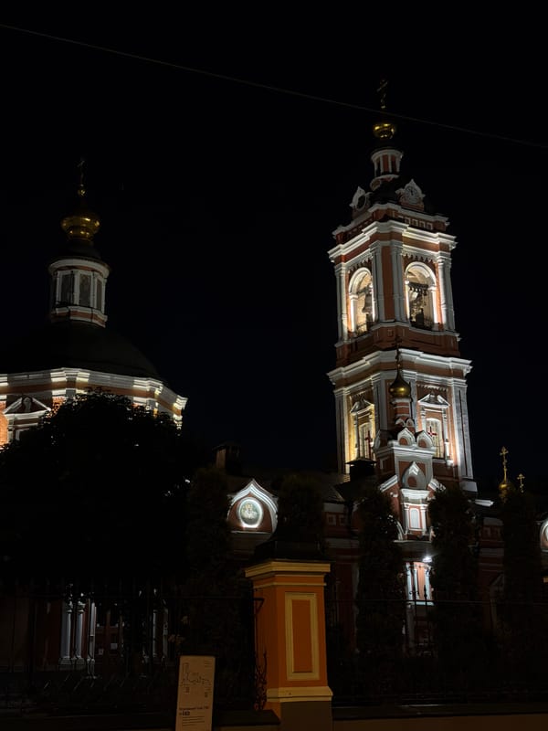 Moscow evening scenes show illuminated churches, street gatherings, restaurant activity