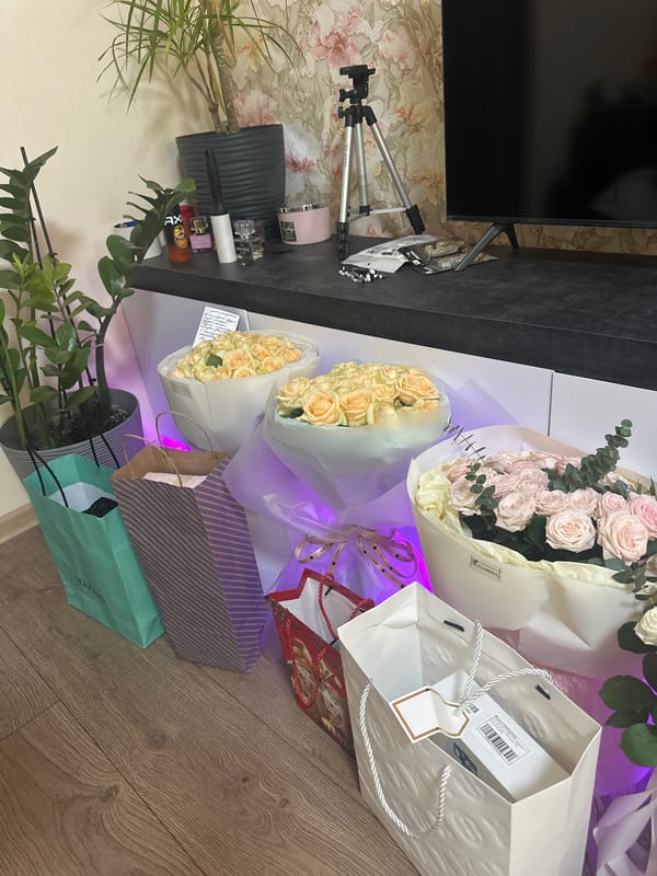 Flowers and gift bags arranged in a Izmail living room
