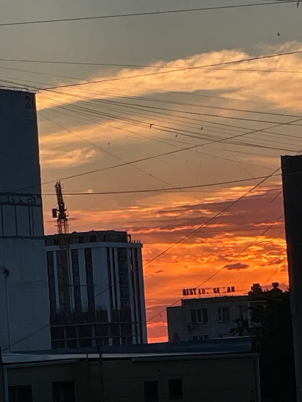 Sunset over Aktau, with street scenes and quiet indoor moments.