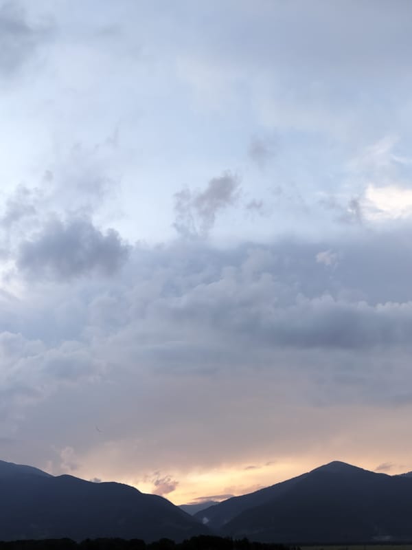 Dramatic skies documented over Bulgarian mountains during evening hour