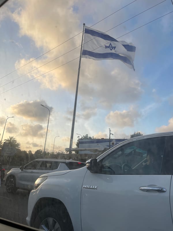Israeli flag observed on busy street in Herzliya area