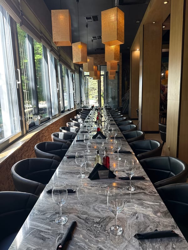 Formal restaurant dining room prepared for service in Pernik
