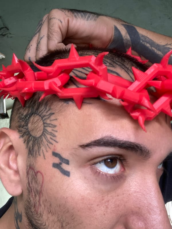 Tattooed individual displays yellow liquid in bottle in Buenos Aires