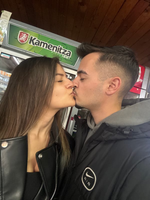 Young adults socialize, pose for photos at Sofia pub