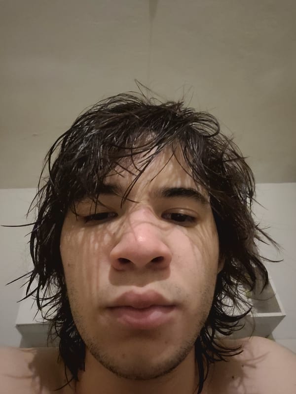 Portrait captured in Catamarca shows young man with wet hair