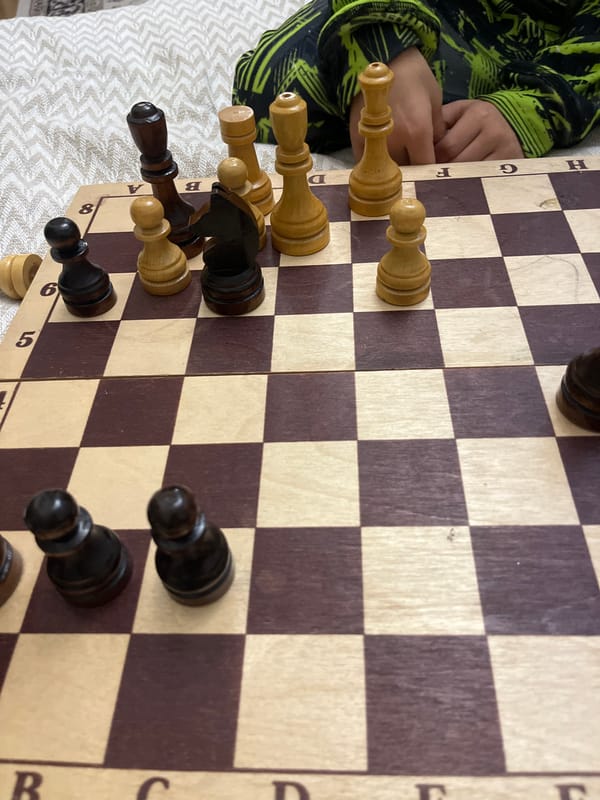 Child plays chess game in Kaspiysk, Russia