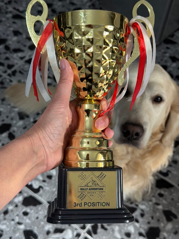 Rally trophy and 3D-printed dog figurine displayed in Tbilisi