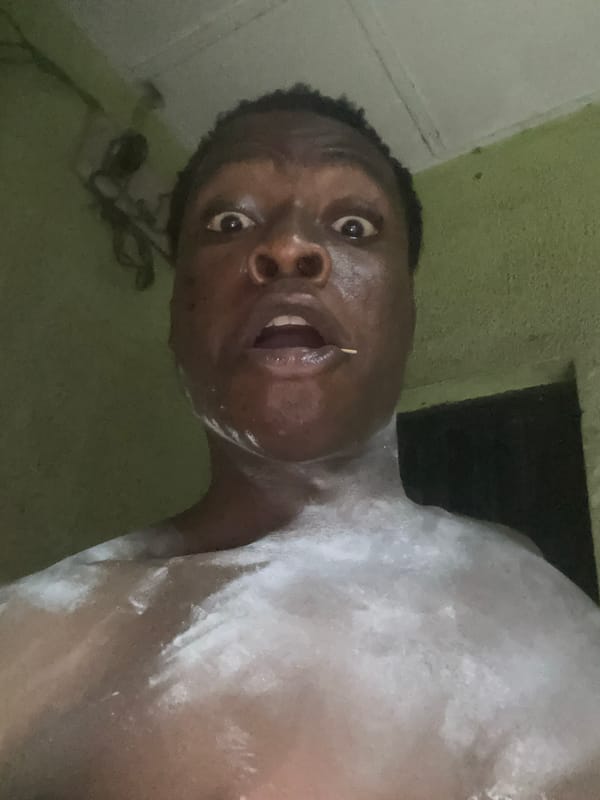 Person photographed with white substance at unknown location