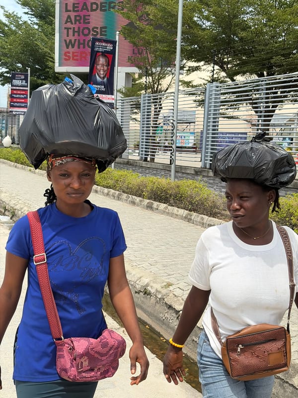 Daily life continues in Igboefon with street activity