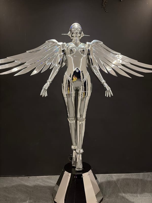 Illuminated sculptures and live art at a nighttime installation in Koh Samui