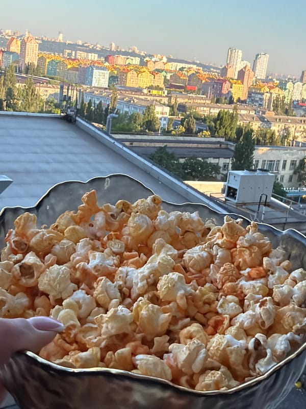 Rooftop morning in Kyiv with city views and quiet downtime