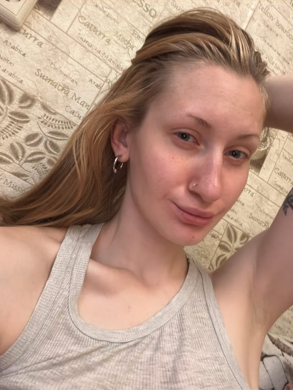 Morning selfie session in a Saint Petersburg bedroom
