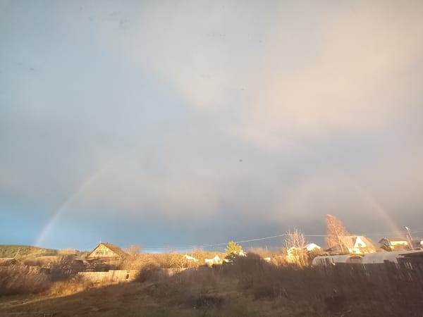 Double rainbow appears over Ольховка, Russia countryside