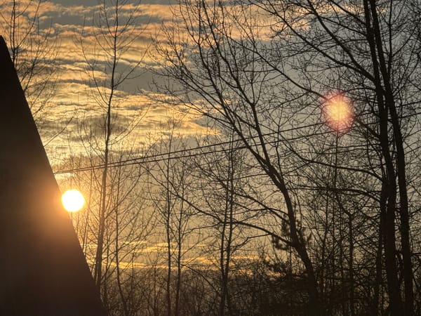 Sunset scenes documented in Chaikovsky, Russia during spring evening
