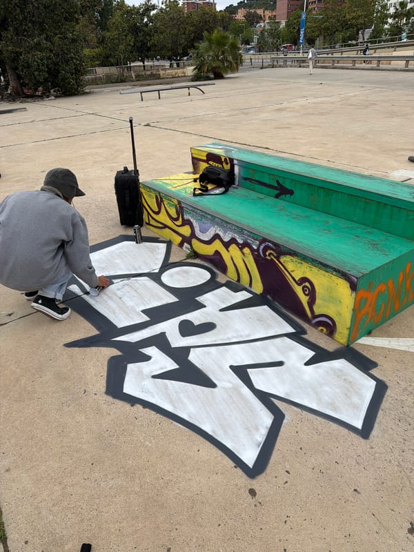 Morning scenes across Barcelona: graffiti, rooftop observer, escalator maintenance