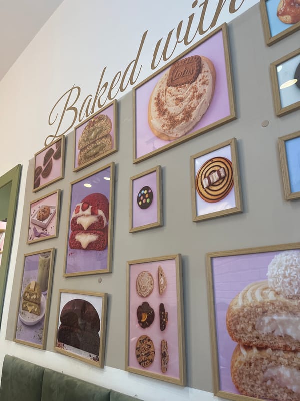 Cookie café visit documented in Krakow with displays and signage