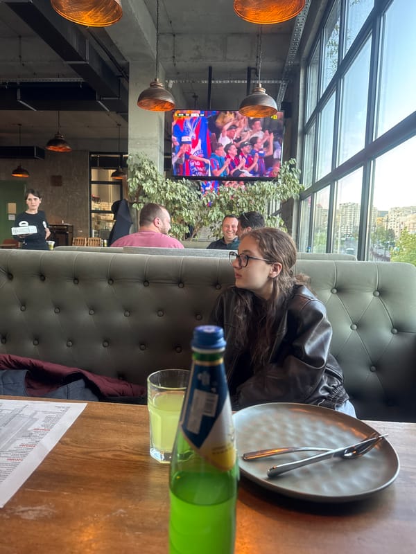 Woman dines at modern restaurant in Tbilisi