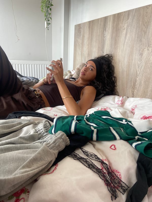 Woman poses for photos in London room