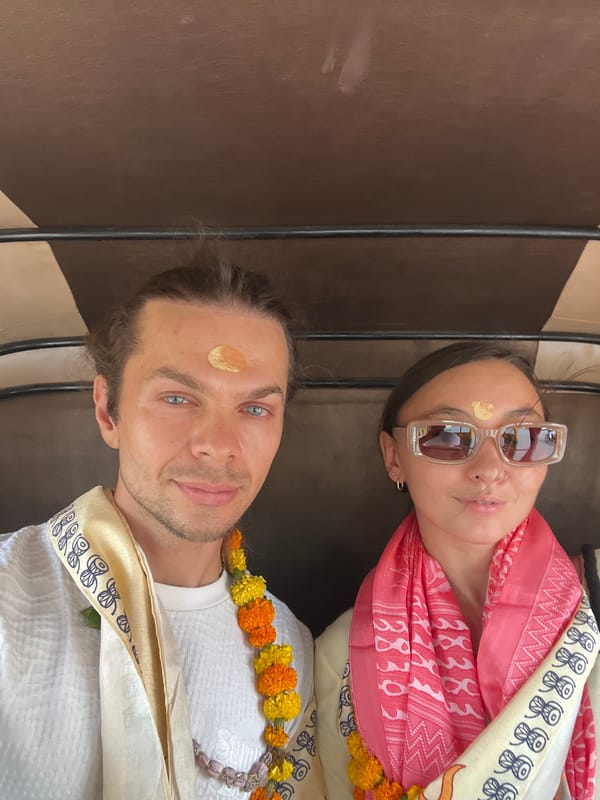Tourists pose for selfies in auto-rickshaw in Varanasi