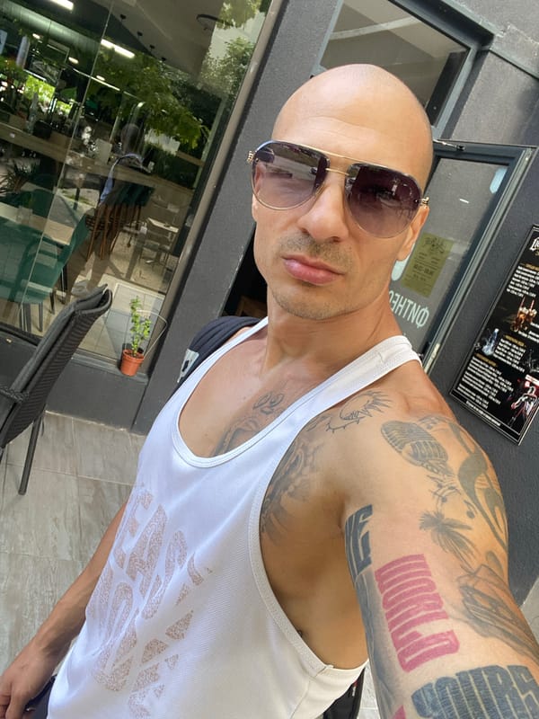 Selfie session at a Pleven café, tattoos and all
