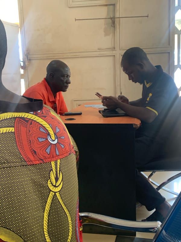 Indoor scenes show people in office and waiting areas