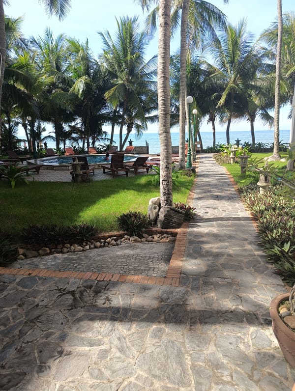 Poolside afternoon and street life at a Vietnamese beach resort