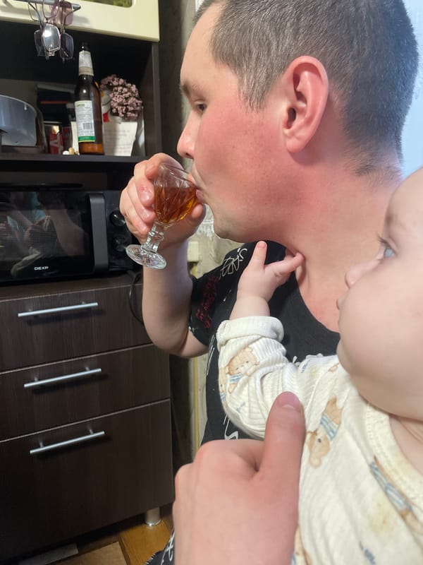 Family meal and baby feeding captured in Kuyeda home