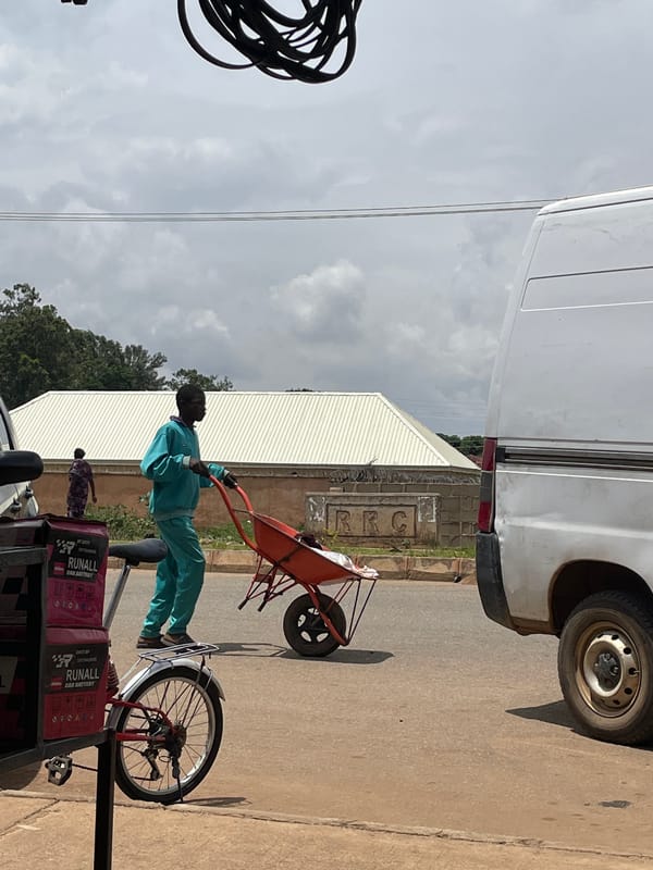 Morning street life and commerce along Bukuru's roads