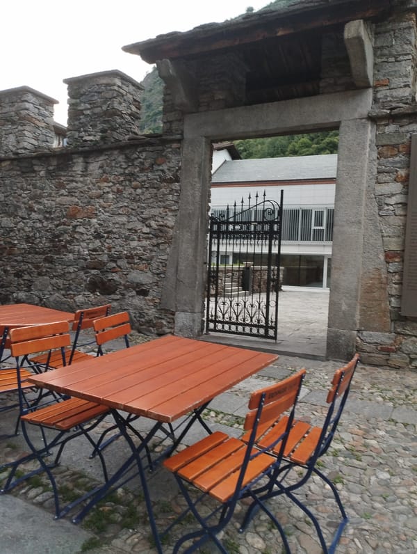 Walking tour through Biasca streets and local businesses