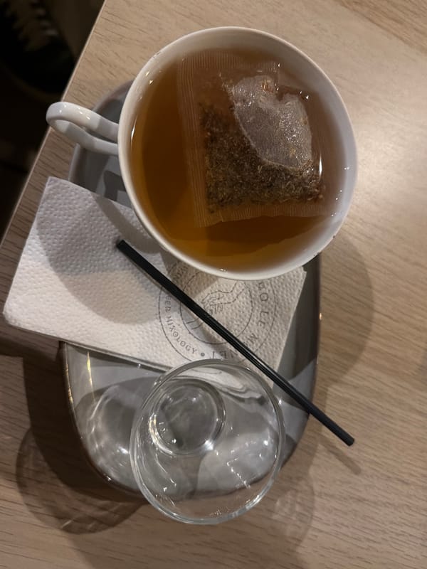 Tea service observed at cafe location during early morning