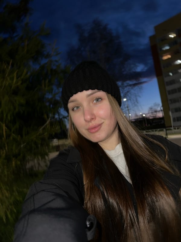 Woman documents evening photo session in Chaikovsky, Russia