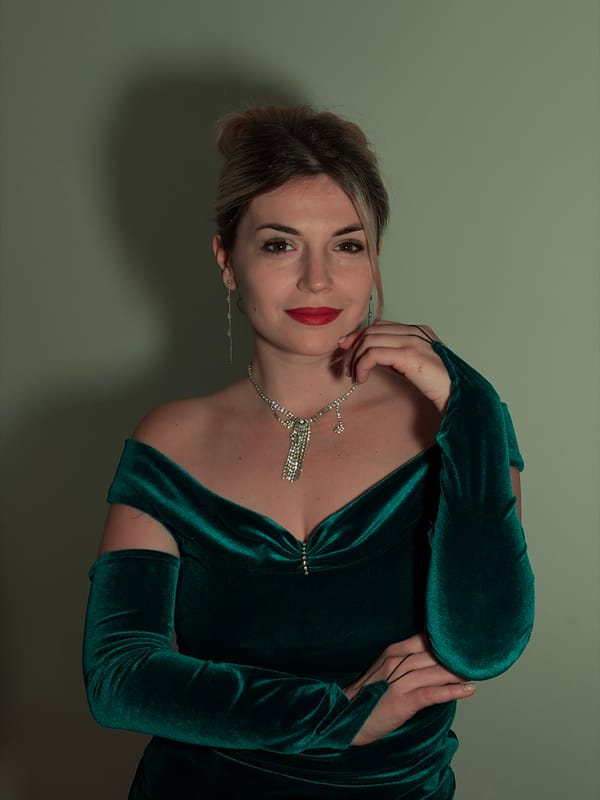 Woman in Green Velvet Dress Photographed in Budva Portrait Session
