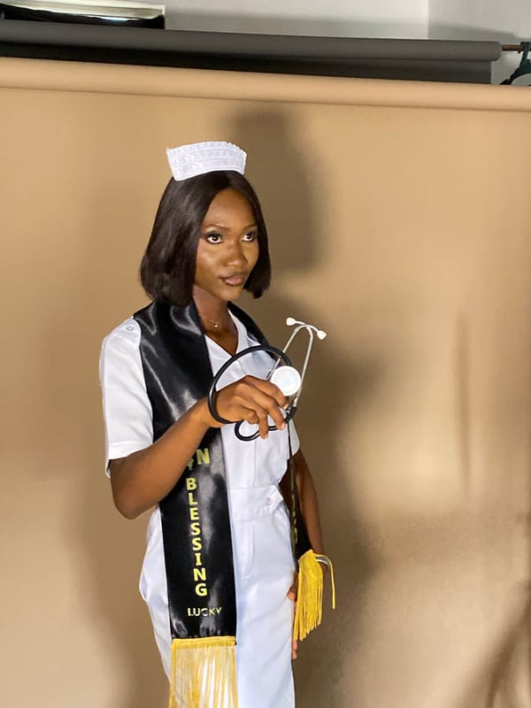 Nurse poses for studio portrait in Nigeria